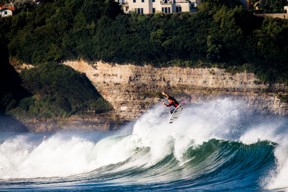Nicholas Vergas throws a full rotor during a warm up free surf in Anglet.