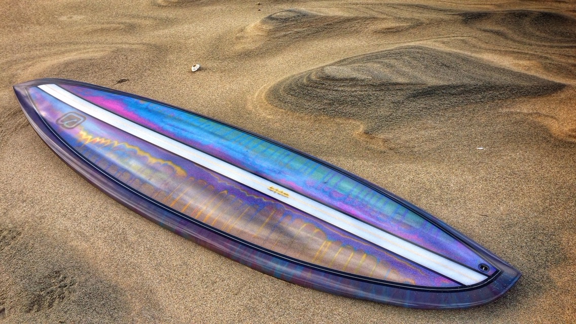 A Jay Surfboards resin-tint asymmetrical surfboard.